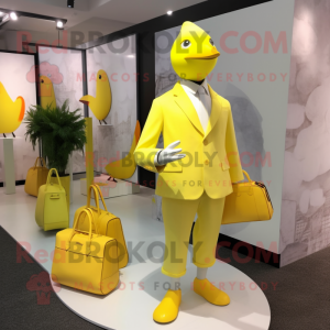 Lemon Yellow Dove mascot costume character dressed with a Suit and Tote bags