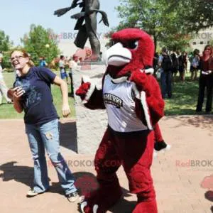 Black and white red eagle mascot in sportswear - Redbrokoly.com