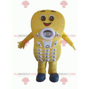 Mascote gigante e sorridente de celular amarelo - Redbrokoly.com