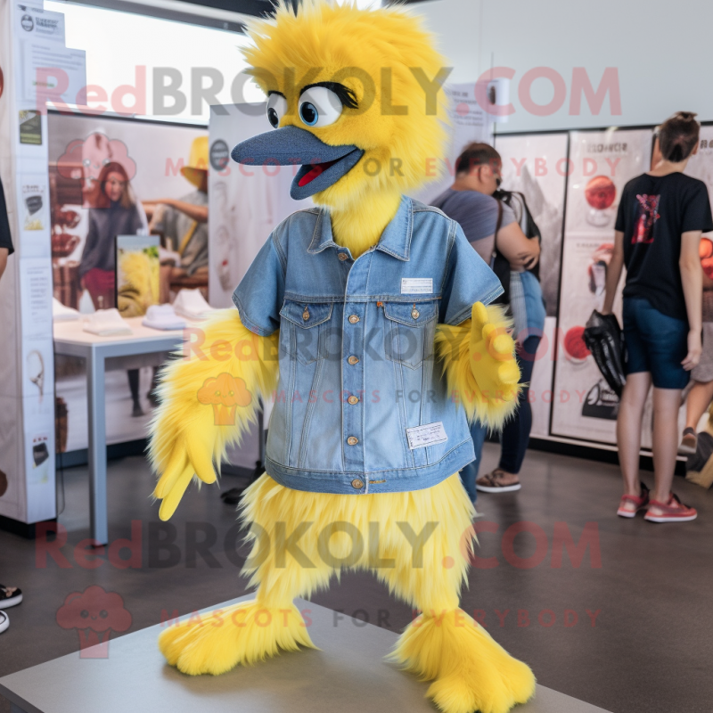 Lemon Yellow Emu mascot costume character dressed with a Denim Shorts and Lapel pins