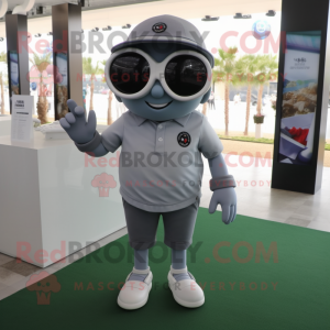 Gray Cyclops mascot costume character dressed with a Polo Shirt and Sunglasses