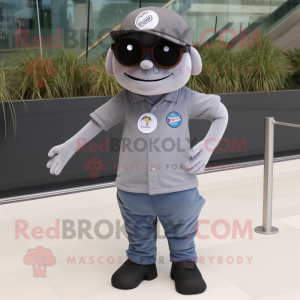 Gray Cyclops mascot costume character dressed with a Polo Shirt and Sunglasses