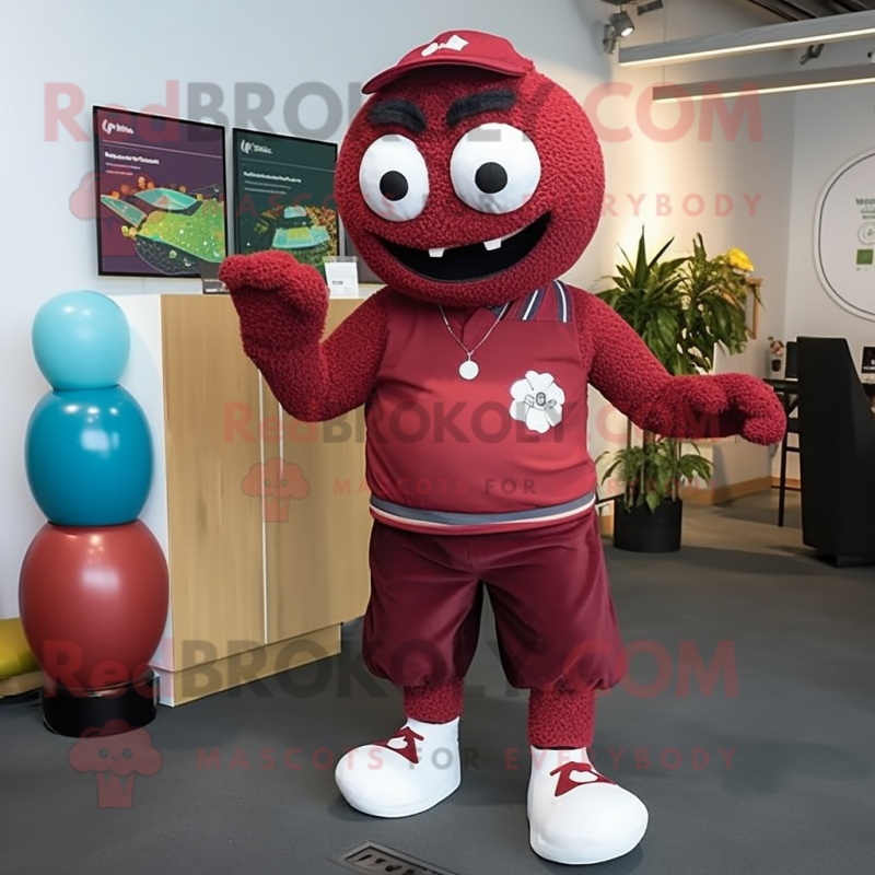 Maroon Juggle mascot costume character dressed with a Rash Guard and Anklets Maroon Juggle mascot costume character dressed with a Rash Guard and Anklets