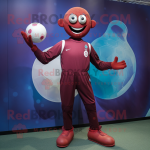 Maroon Juggle mascot costume character dressed with a Rash Guard and Anklets