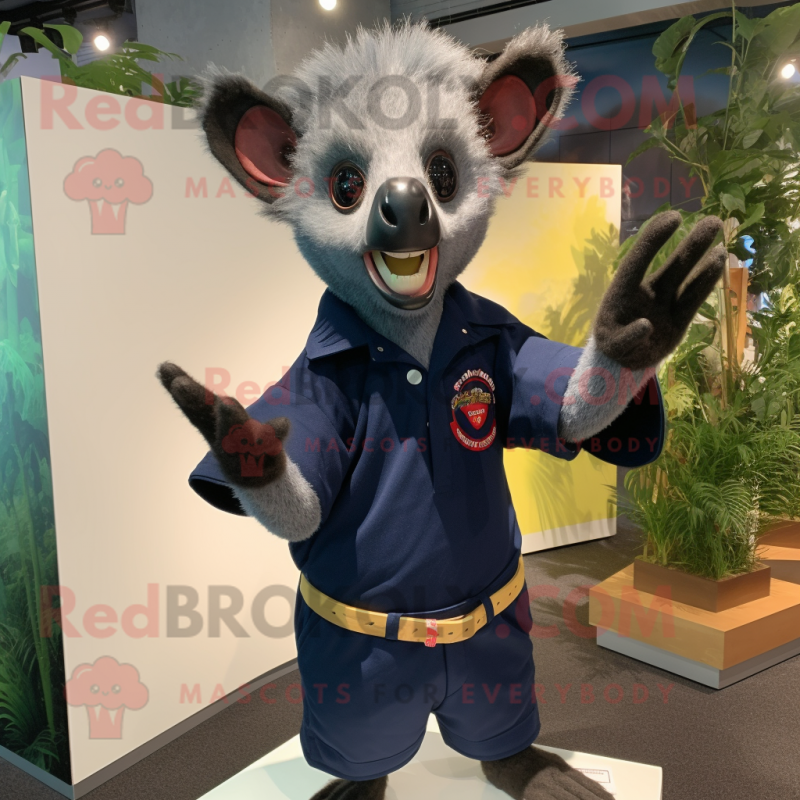 Navy Aye-Aye mascot costume character dressed with a Polo Tee and Cufflinks Navy Aye-Aye mascot costume character dressed with a Polo Tee and Cufflinks