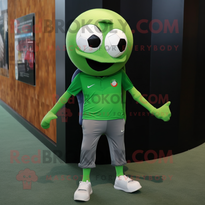 Olive Soccer Ball mascot costume character dressed with a Skinny Jeans and Briefcases Olive Soccer Ball mascot costume character dressed with a Skinny Jeans and Briefcases
