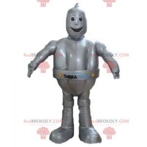 Mascote robô gigante e sorridente cinza metálico -