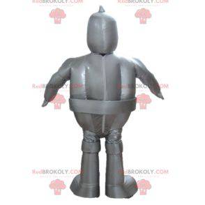 Mascotte robot grigio metallizzato gigante e sorridente -