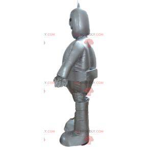 Mascotte de robot gris métallisé géant et souriant -