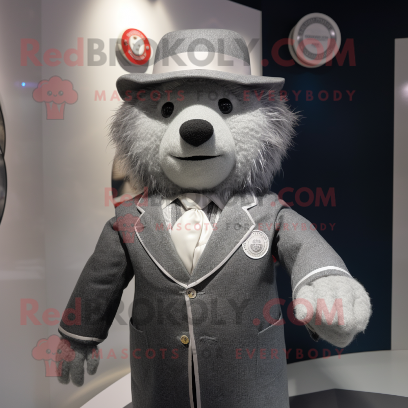 Gray But mascot costume character dressed with a Suit Jacket and Brooches