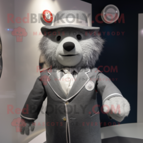 Gray But mascot costume character dressed with a Suit Jacket and Brooches