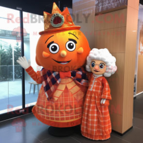 Orange Queen mascot costume character dressed with a Flannel Shirt and Shawls