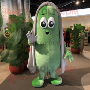Silver Cucumber mascot costume character dressed with a Corduroy Pants and Rings