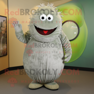 Silver Cucumber mascot costume character dressed with a Corduroy Pants and Rings