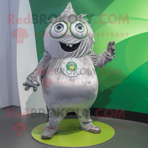 Silver Cucumber mascot costume character dressed with a Corduroy Pants and Rings