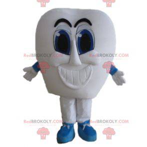 Mascotte de dent blanche géante avec les yeux bleus -