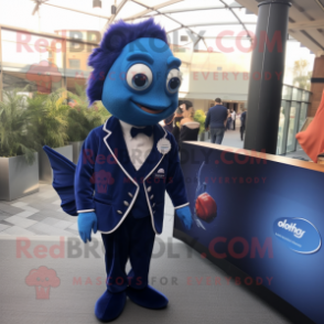 Navy Betta Fish mascot costume character dressed with a Suit Jacket and Lapel pins