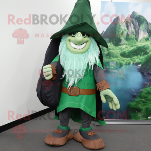 Forest Green Witch'S Hat mascot costume character dressed with a Board Shorts and Backpacks