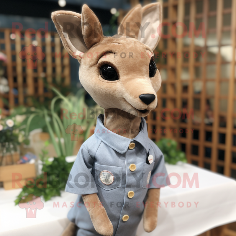 Beige Roe Deer mascot costume character dressed with a Chambray Shirt and Lapel pins