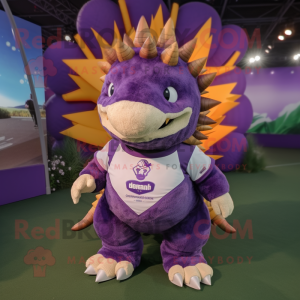 Purple Stegosaurus mascot costume character dressed with a Rugby Shirt and Shoe clips