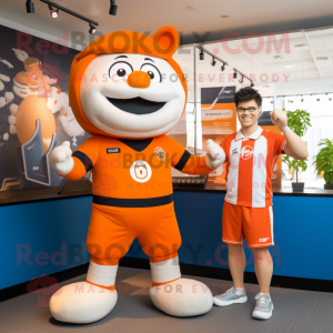 Orange Pho mascot costume character dressed with a Rugby Shirt and Watches