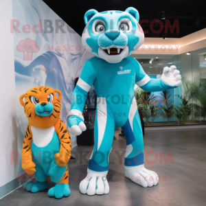 Cyan Saber-Toothed Tiger mascot costume character dressed with a Rash Guard and Watches