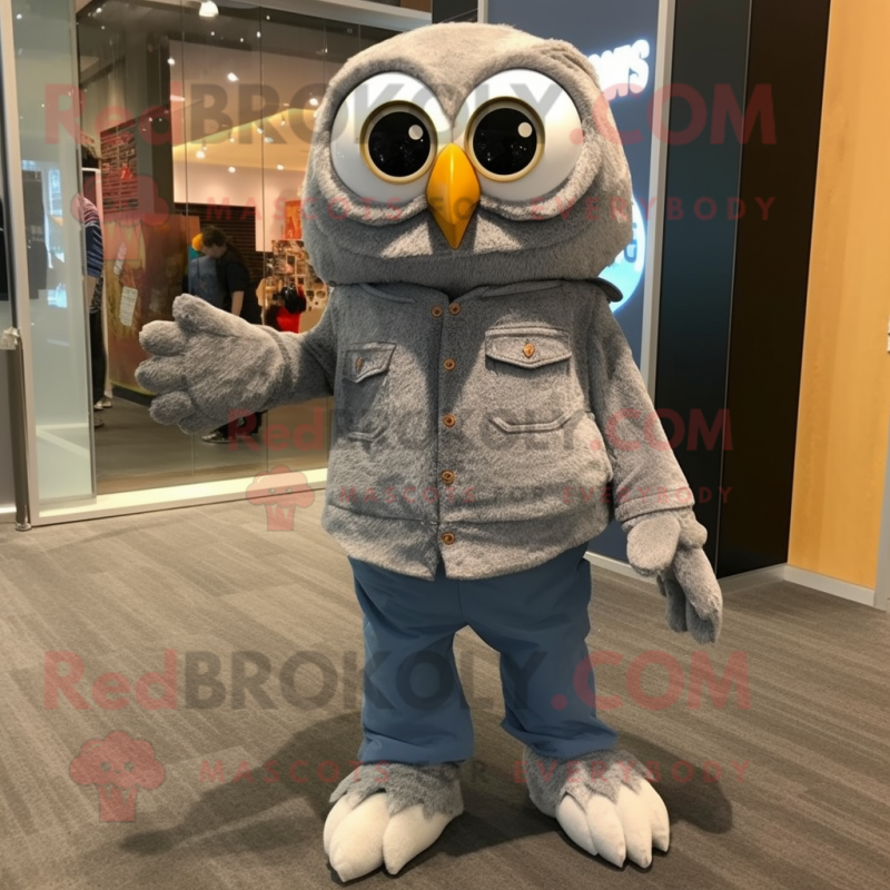 Gray Owl mascot costume character dressed with a Bootcut Jeans and Foot pads