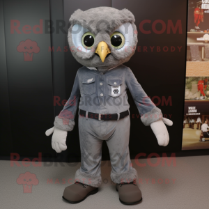 Gray Owl mascot costume character dressed with a Bootcut Jeans and Foot pads