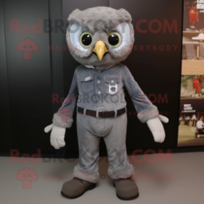 Gray Owl mascot costume character dressed with a Bootcut Jeans and Foot pads