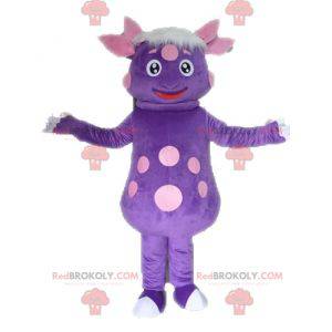 Mascotte di dinosauro con pois. Mascotte creatura viola -