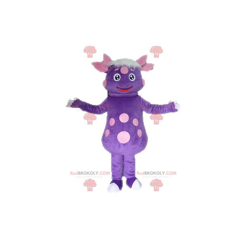 Dinosaur mascot with polka dots. Purple creature mascot -