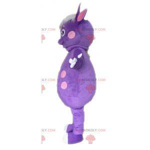 Dinosaur mascot with polka dots. Purple creature mascot -