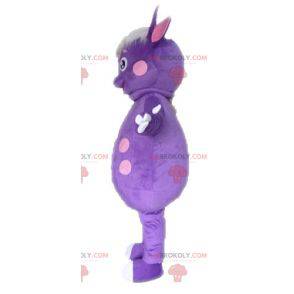 Dinosaur mascot with polka dots. Purple creature mascot -