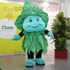 Turquoise Cabbage Leaf mascot costume character dressed with a Shorts and Lapel pins