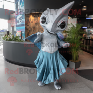 Silver Manta Ray mascot costume character dressed with a Cocktail Dress and Clutch bags