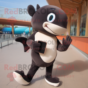 Brown Killer Whale mascot costume character dressed with Leggings and Wallets