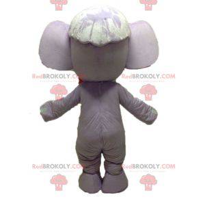 Lila und rosa Elefantenmaskottchen. Lila Maskottchen -