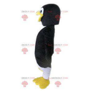 Mascote pinguim gigante preto e branco - Redbrokoly.com
