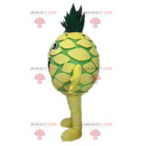 Gigantische gele en groene ananasmascotte. Fruit mascotte -