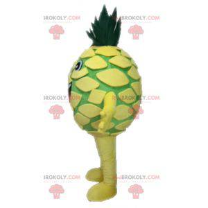 Gigantisk gul og grønn ananas maskot. Fruktmaskott -