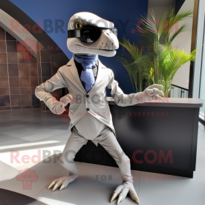 Gray Velociraptor mascot costume character dressed with Blazer and Sunglasses