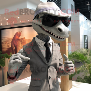 Gray Velociraptor mascot costume character dressed with Blazer and Sunglasses