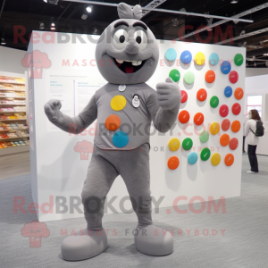 Gray Candy mascot costume character dressed with Yoga Pants and Cufflinks