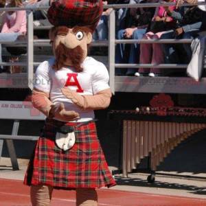 Mascotte d'écossais moustachu en kilt à carreaux -