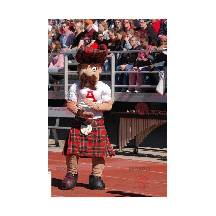 Mustached Scottish mascot in plaid kilt - Redbrokoly.com