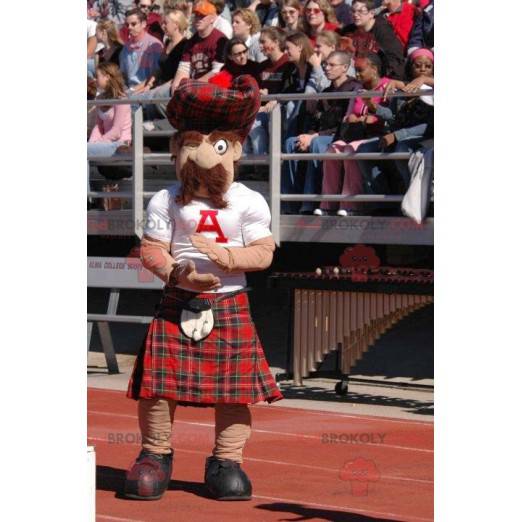 Schottisches Maskottchen mit Schnurrbart und kariertem Kilt -