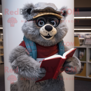 Gray Momentum mascot costume character dressed with Corduroy Pants and Reading glasses