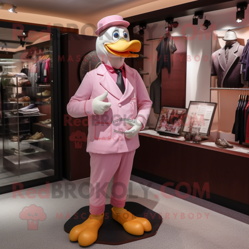 Pink Muscovy Duck mascot costume character dressed with Suit Pants and Wallets