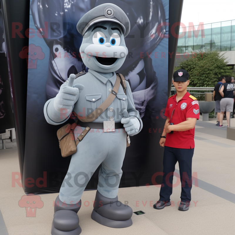 Gray Commando mascot costume character dressed with Boyfriend Jeans and Lapel pins