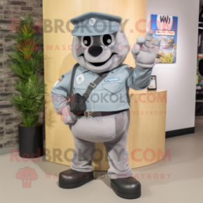 Gray Commando mascot costume character dressed with Boyfriend Jeans and Lapel pins